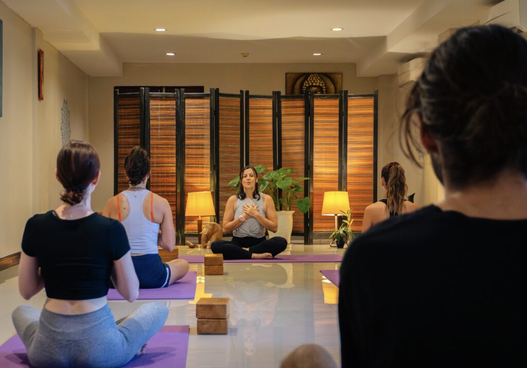 Amy teaching yoga at silver naga hotel